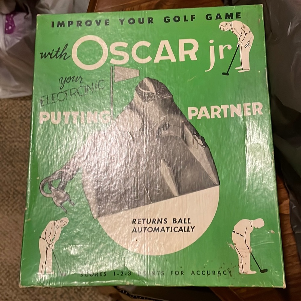 Vintage Oscar Jr electronic putting partner